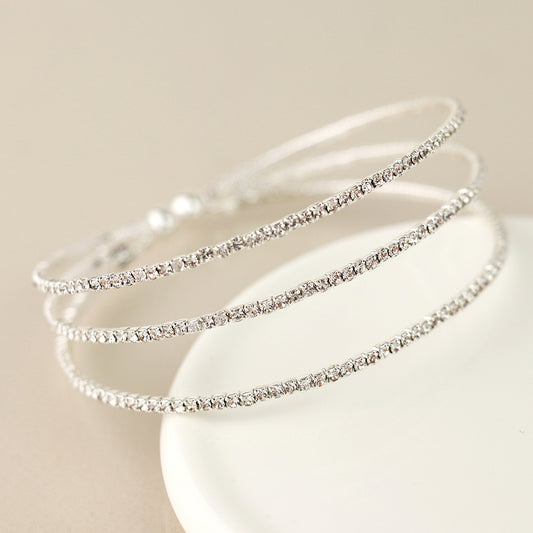 POM Silver plated triple strand crystal bracelet