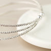 POM Silver plated triple strand crystal bracelet