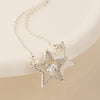 POM Silver plated double star and crystal heart necklace