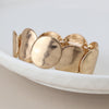 POM Golden worn disc stretch bracelet