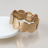 POM Golden worn disc stretch bracelet