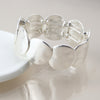Silver plated worn disc stretch bracelet