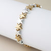 POM Silver plated and golden stars stretch bracelet